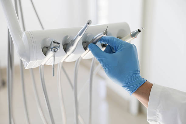 Professional Tooth Extraction technician working in State Center, IA